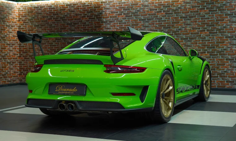 Porsche 911 GT3 RS in Green Luxury Car Dealership in Dubai