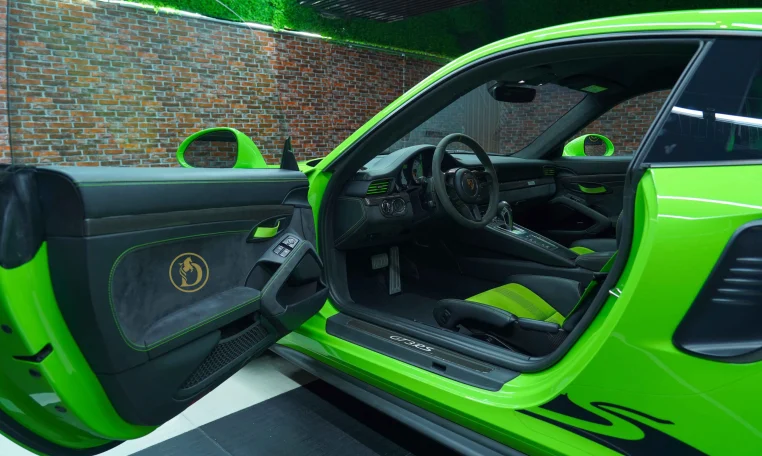 Porsche 911 GT3 RS in Green Dealership in UAE