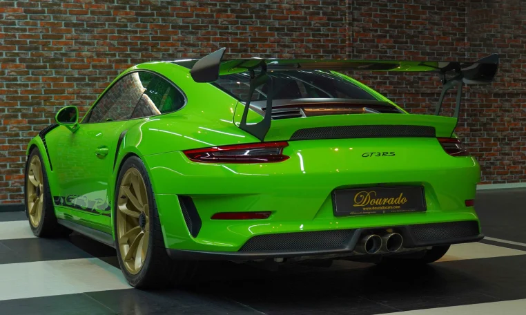 Porsche 911 GT3 RS in Green Exotic Car Dealership in Dubai