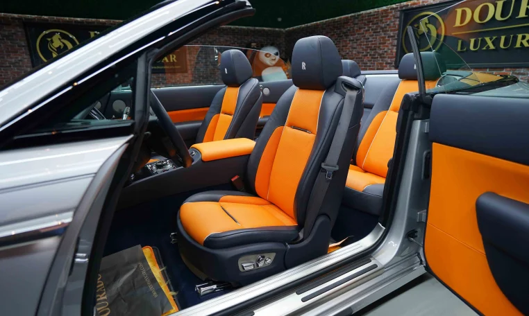 Rolls Royce Dawn in Silver Exotic Car Dealership in Dubai