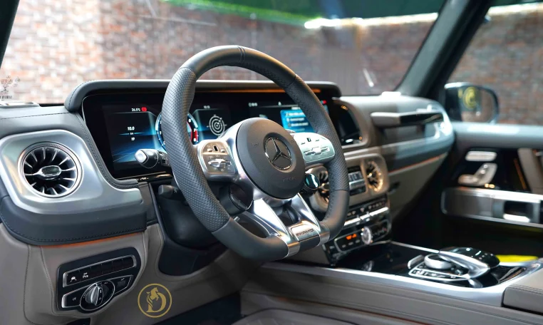 Mercedes g 63 AMG Double in Brown Exotic Car Dealership in UAE