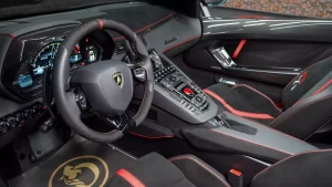 Lamborghini Aventador SVJ Roadster in Red Car Dealership in Dubai