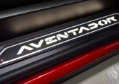 Lamborghini Aventador SVJ Roadster in Red Luxury Car Dealership in Dubai