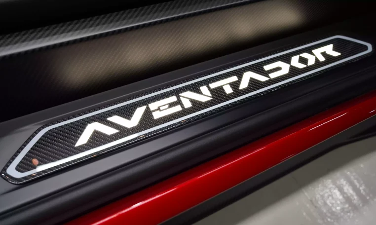 Lamborghini Aventador SVJ Roadster in Red Luxury Car Dealership in Dubai