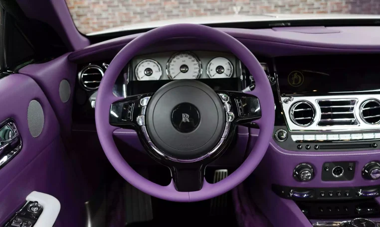 Rolls Royce Dawn in White Car Dealership in Dubai