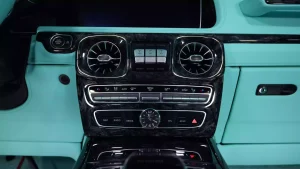 G7X Onyx Concept 1 of 5 Hyacinth Red Metallic Luxury Car Showroom Dubai