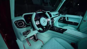 G7X Onyx Concept 1 of 5 Hyacinth Red Metallic Luxury Car Showroom