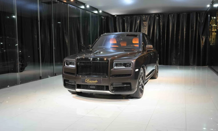 Rolls Royce Cullinan Black Badge in Brown Obsidian luxury car in Dubai