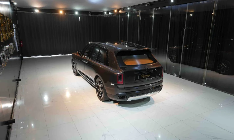 Rolls Royce Cullinan Black Badge in Brown Obsidian elite car in Dubai
