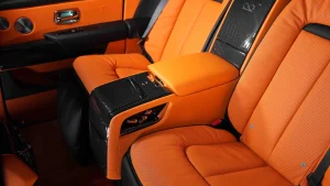 Buy Rolls Royce Cullinan Black Badge in Brown Obsidian luxury car in UAE